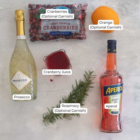 Winter Aperol Spritz - The Hangry Economist How To Make Aperol Spritz, Santa Spritz Cocktail, Christmas Aperol Spritz, Santa Spritz, Winter Aperol Spritz, Hot Aperol, Pear Gin, Bday Food, Creative Drinks