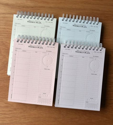 two spiral bound notebooks sitting next to each other on a wooden table with writing paper Free Weekly Planner Templates, Free Weekly Planner, Medical Receptionist, Spiral Planner, Weekly Planner Free Printable, Weekly Planner Free, Unique Planner, Spiral Planners, Business Marketing Plan