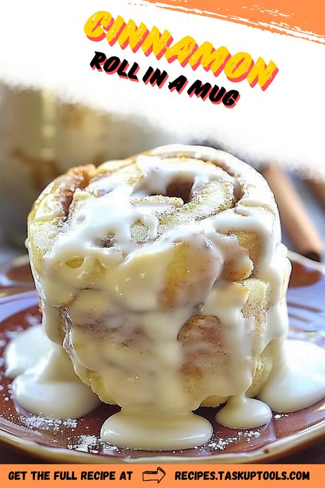 Indulge in the ultimate comfort treat with this quick and easy Cinnamon Roll in a Mug recipe. Perfect for those mornings when you crave a warm, gooey cinnamon roll but don't want to spend hours in the kitchen. Just mix a few simple ingredients in your favorite mug, microwave for a deliciously soft and fluffy dessert, and top with a drizzle of creamy icing. Whether you're treating yourself or impressing guests, this single-serving cinnamon roll is the ideal solution for instant satisfaction. Pin it now for Cinnamon Bun In A Mug, Single Serve Cinnamon Roll In A Mug, Single Serving Recipes Desserts, Mug Cinnamon Roll Microwave, Mug Cinnamon Roll, Cinnamon Roll In A Mug, Cinnamon Roll Mug Cake, Quick Cinnamon Rolls, Mug Recipe