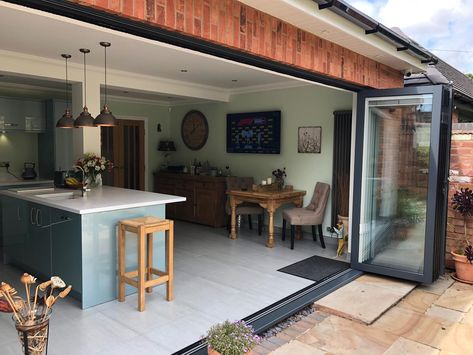 Kitchen Opens To Patio, Open Kitchen Lounge, Open Kitchen To Garden, Kitchen Leading To Patio, Corner Bifold Doors Kitchen, Open Plan Kitchen Bifold Doors, Kitchen With Bifold Doors, Kitchen Lounge Open Plan, Kitchen Extension Ideas Bi Fold Doors