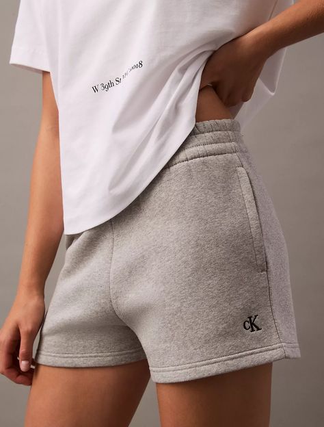 Reimagined classics, iconic Calvin. Designed with an archive-inspired logo, these updated Calvin Klein shorts feature a plush cotton knit fleece blend for premium, all-day comfort. Finished with an elasticated waistband and angled front slip pockets. Archive Logo, Calvin Klein Shorts, Fleece Shorts, Cotton Knit, Calvin Klein, ? Logo, Knitting, Pants, Clothes