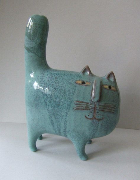 Ceramic cat from Lisa Larson, Gustavsberg Sweden:  Lisa Larson is a Swedish ceramic designer who started at Gustavsberg Porcelain Factory in 1954. Since 1980 she works as a freelance designer and sculptural artist. http://lisalarsonsweden.com #Pottery #Stoneware #Ceramic #cat #LisaLarson Ceramic Cats, Lisa Larson, Pottery Animals, Sculptures Céramiques, Pottery Handbuilding, Ceramic Cat, Clay Animals, Pottery Sculpture, Ceramic Animals