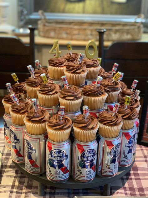 Beer Can Centerpieces, Beer Themed Party Food, Beer Themed Dessert Table, Beer Can Table Decorations, Cheers And Beers Party Cake, Cheers And Beers Party Food, Beer Can Decorations, Cheers And Beers 50th Birthday Party, Cheers And Beers Birthday Cake