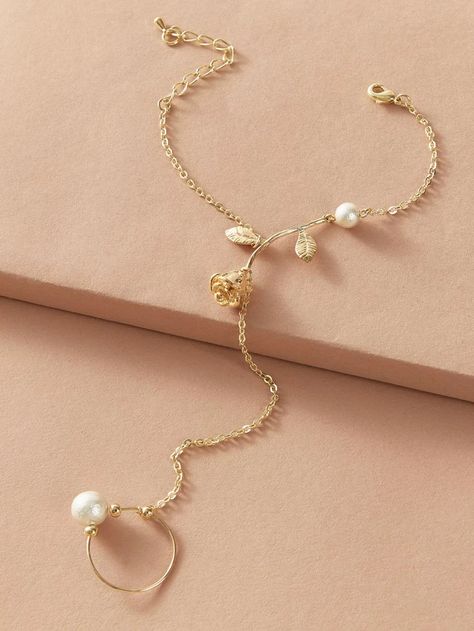 1pc Rose & Faux Pearl Decor Finger Chain Bracelet | SHEIN Ring Chain Bracelet, Bracelet Tags, Pearls Fashion, Hand Jewelry Rings, Hand Chain Jewelry, Finger Bracelets, Hand Chain Bracelet, Pretty Jewelry Necklaces, Silver Bracelets For Women