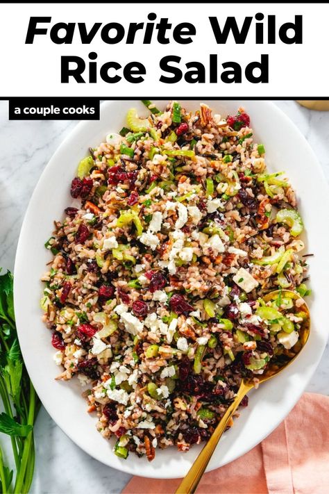 This wild rice salad recipe is simple and bursting with flavor, with crunchy veggies, pecans, cranberries, a zingy dressing, and feta cheese! #wildrice #wildricesalad #wildricesaladrecipe #wildricerecipe #sidedish #saladrecipe #easysalad #thanksgiving #thanksgivingsidedish #easysidedish Wild Rice Salad With Cranberries And Pecans, Wild Rice Cranberry Salad, Wild Rice Salads, Wild Rice Dishes, Simple Thanksgiving Salad, Wild Rice Salad Recipe Cold, Crunchy Rice Salad, Wildrice Sidedish, Recipes With Wild Rice