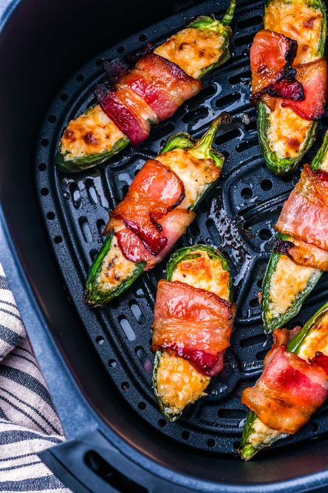 Spicy, cheesy, and perfectly crispy, these air fryer bacon wrapped jalapeno poppers are my go-to snack for a quick and delicious bite. You’ll love them! Air Fried Jalapeno, Fried Jalapeno Poppers, Wrapped Jalapeno Poppers, Jalapeno Poppers Recipe, Easy Bacon Recipes, Frying Recipes, Air Fryer Bacon, Bacon Wrapped Jalapeno Poppers, Jalapeno Popper Recipes