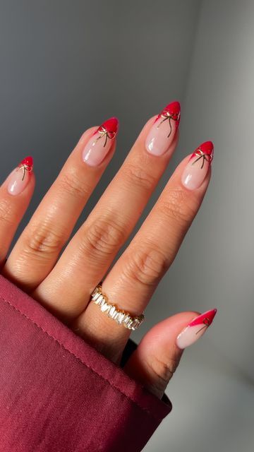 Teerah on Instagram: "something classic but chic 🍒🎀♥️✨  @leminimacaron  Ruby red Too coat  Aff code “embrace15”  @daily_charme  Nail stickers aff code “embrace”  #leminimacaron #frenchtip #chicnails #nailtutorials #frenchtipsnails  nails, red, bow nails, nail stickers, French tips, chic, classy, aesthetic nails, gel, gel polish, gel nail art, Pinterest nails, tutorials" Nails With One French Tip, Red French Tips With White Bow, Red French Tip Nails With Bow Square, Red French With Bow Nails, Red French Bow Nails, Red And Gold Bow Nails, Red French Tip With White Bow, French Tip Stickers, Red French With Bow