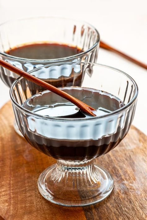 two glass bowls contain organic black cane molasses on a wooden table Homemade Molasses Syrup, How To Make Molasses Homemade, Diy Molasses, Molasses Syrup, Homemade Molasses, How To Make Molasses, Molasses Substitute, Molasses Recipes, Banana Bread Pudding