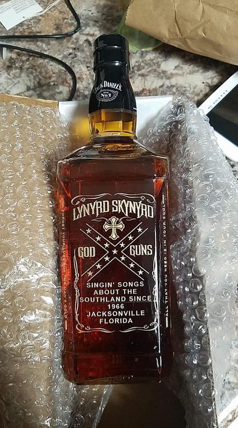 Jack Daniel’s, Lynyrd Skynyrd custom made whiskey bottle. Jack Daniels Bottle, Jack Daniel's Tennessee Whiskey, Alcohol Dispenser, Moonshine Recipes, Liquor Dispenser, Lynyrd Skynyrd, Cocktail Desserts, Cigars And Whiskey, Jack Daniel