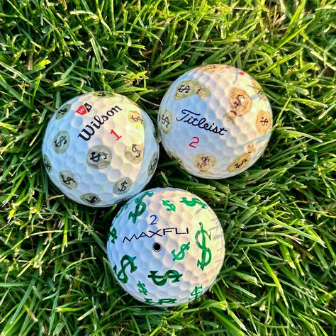 Discover a one-of-a-kind collection of hand-painted golf balls, each meticulously crafted to add a touch of artistic flair to your game. Perfect for players, collectors, enthusiasts, or as a distinctive gift idea.  Every ball is individually decorated  with intricate designs, ensuring no two are alike. Enhance your game with these functional pieces of art that combine craftsmanship with creativity. Ideal for golfers who appreciate both performance and aesthetics.  *Please note: Balls used are pr Golf Ball Painting Ideas, Cute Golf Ball Designs, Golf Ball Drawing Ideas, Custom Golf Balls, Decorating Golf Balls, Golf Ball Designs Sharpie For Boyfriend, Drawing On Golf Balls, Decorated Golf Balls, Painting Golf Balls