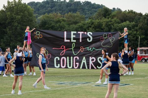 Neon Run Through Signs Football, Glow Pep Rally Signs, Neon Cheer Theme, Pep Rally Signs Posters, Camo Pep Rally Theme, Neon Pep Rally Signs, Western Pep Rally Signs, Student Section Chants, Cheer Football Banners