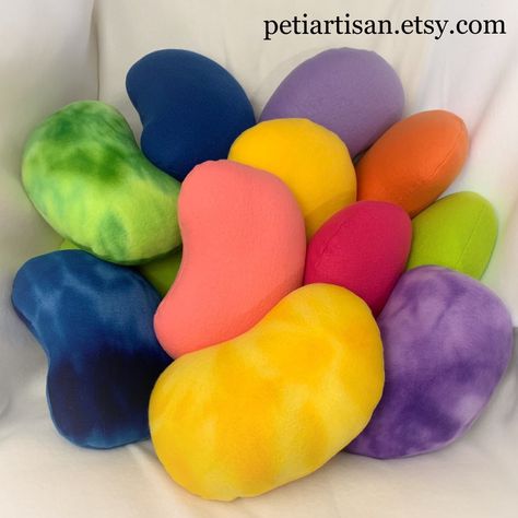 "This listing is for ONE Jelly Bean pillow. Pick your favorite color or make it a set. These pillows can be made in different colors by request. These Jelly Bean pillows are perfect decor for any room! It will brighten your living room, play room, nursery, beach houses, etc. The pillows is handmade from soft fleece and filled with non-allergenic fiberfill.  Size- Small - 10/6\" Large 14\"/8\" All products are handmade by me in a smoke-free environment." Weird Pillows, Candy Room, Candy Pillows, Food Pillows, Cute Pillow, Cute Furniture, Shaped Pillow, Knitting Machine Projects, Diy Furniture Renovation