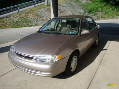 1998 Sandrift Pearl Metallic Toyota Corolla CE #30816199 Photo #3 | GTCarLot.com - Car Color Galleries Corolla 1998, Beige Interior, Car Colors, Photo Archive, Metallic Colors, Toyota Corolla, House Colors, Toyota, Color