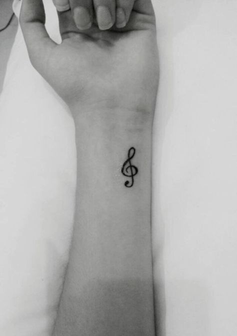 treble clef tattoo on the left wrist Clef Tattoo, Treble Clef Tattoo, Music Notes Tattoo, Tattoo Music, Small Shoulder Tattoos, Music Note Tattoo, Music Tattoo Designs, Note Tattoo, Small Wrist Tattoos