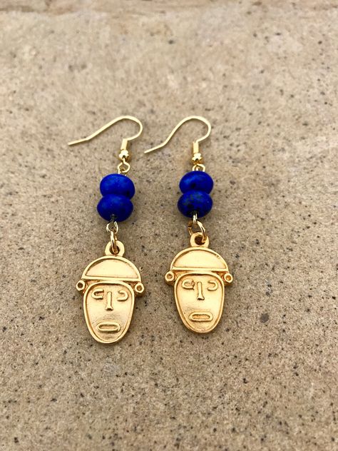 Pre Columbian Earrings  Unique and fun, these gorgeous statement earrings are both modern and primitive at the same time. They feature 24K gold plated Pre Columbian charms and turquoise beads in cobalt. Columbian Jewelry, Brass Jewelry Handmade, Brass Jewellery Handmade, Etched Jewelry, Earrings Unique, Traditional Jewelry, Brass Jewelry, Turquoise Beads, Jewelry Handmade