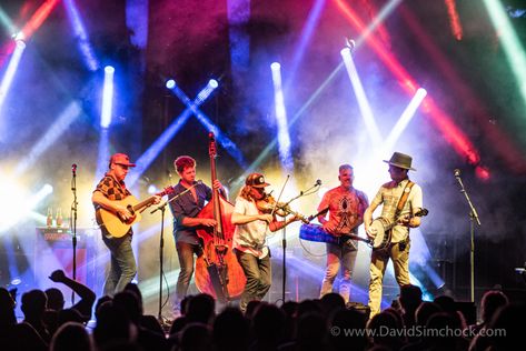 This will be my last Infamous Stringdusters post for a while. I hope you enjoyed everything! I'll wrap it up with a full-band shot, captured from the sound board. Like many of the "unobstructed" images I post, this one took a lot of patience. I think it paid off! The Stringdusters are a fun band to photograph, and even more fun to experience their talent and live performance. Of course, their stage lighting adds an additional element to the show, and the music, lights, and energy all come tog Musicians On Stage, Live Music Band, Band Performance, Sound Board, Concert Lights, Festival Photography, Band Group, Be My Last, Concert Band