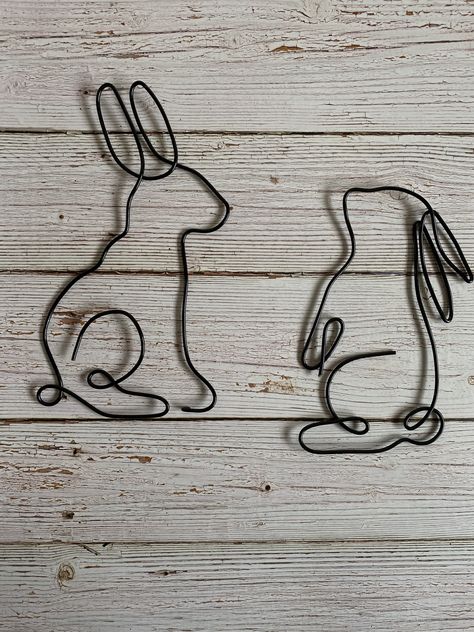 Wire bunnies • Wire wall decor • Home decor • Pet gifts • Pet lovers • Animal lovers Wire Bunny, Wire Wall Decor, Abc Crafts, Wire Words, Wire Jig, Wire Knitting, Rabbit Garden, Wire Art Sculpture, Copper Crafts