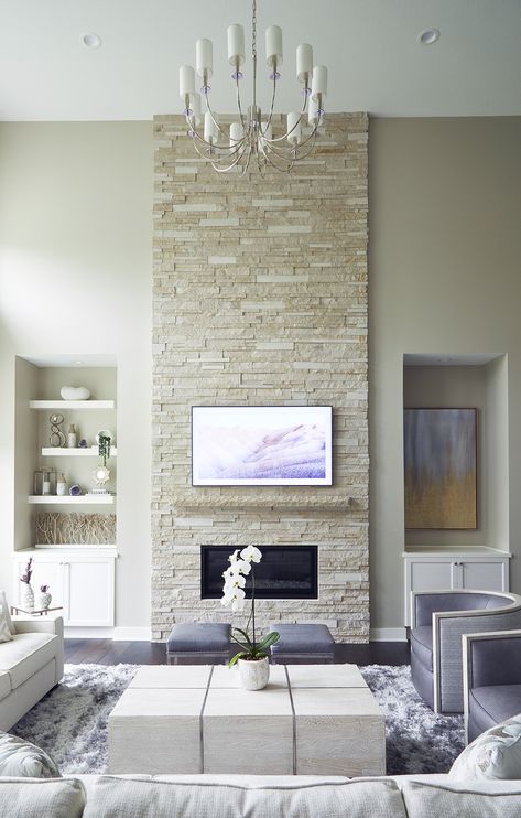 Transitional living room design with stacked stone fireplace and dark hickory floors by Jillian Lare Interior Design - Des Moines, Iowa. #livingroom #interiordesign #livingroomdecor Hickory Floors, Fireplace Feature, Mantel Styling, Tv Fireplace, Transitional Living Room Design, Interior Farmhouse, Light Grey Paint Colors, Grey Walls Living Room, Stacked Stone Fireplaces