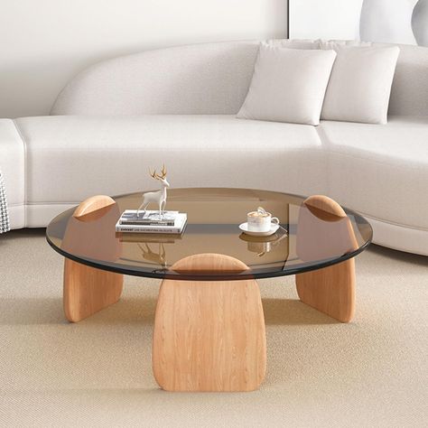 PRICES MAY VARY. Thickened 3cm frame: The round glass coffee table in the living room adopts a circular frame constructed with tooth-jointed tenon technology, which is upgraded and thickened to 3cm to ensure the stability and durability of the frame. The corners are rounded and polished, making it skin-friendly and not stiff. Explosion-proof tempered glass with translucent effect: Glass has high temperature resistance, corrosion resistance, is easy to clean, and is not easy to break. The edges o Circle Wooden Coffee Table, Ground Coffee Table, Wood Glass Coffee Table, Glass Table Styling, Multiple Coffee Tables Together, Funky Furniture Living Room, Current Coffee Table Trends, Vintage Apartment Decor Living Room, Small Living Room Table Ideas