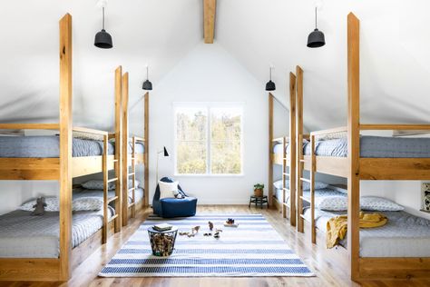 A Low-Maintenance Lake House in Michigan (Hidden Home Office Included) - Remodelista Hidden Home Office, Oak Bunk Beds, Michigan Lake House, Bunk Bed Room, Michigan Lake, Attic Space, Bunk Room, Material Palette, Lake House Decor