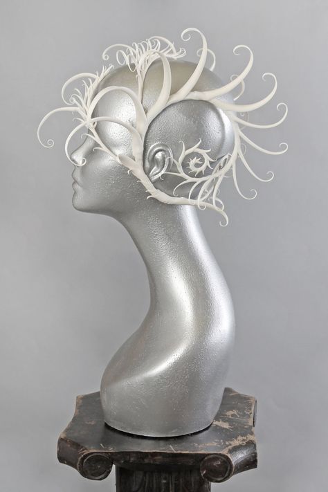 This is a one of a kind piece of wearable art made for the Five and Diamond Sixth Annual Headgear Art Show and shown on August 2, 2018. Kharybdis (mythological sea monster/whirlpool) Middle section is sculpted from flexible spring steel, snugly wrapping around the wearer, a perfect fit for all sizes. This piece is reversible, either open side can be the correct direction. It has two flexible spines on one of the open sides to secure the piece if you are wearing it in that style. Designed and han Headpieces Art, Sculptural Fashion Wearable Art, Headgears For Fashion Show, Art Headpiece, Sea Monster Costume, Head Gears For Fashion Show, Luxury Fantasy Costume Headpieces, Paper Headpiece, Disguise Art