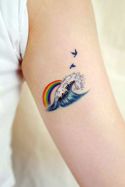 Colored Tattoos For Women Minimalist, Wave Tattoo Ideas Ocean, Colored Minimalist Tattoo For Women, Blue Waves Tattoo, Rainbow Wave Tattoo, Color Wave Tattoo, Small Sea Tattoos For Women, Ocean Waves Tattoo Design, Minimalist Tattoo Colored