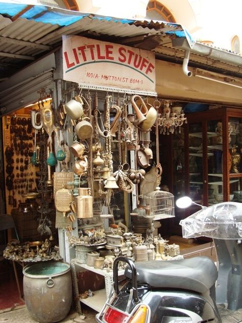 Little Stuff - one of my favourite shops in Mutton Street, Chor Bazaar. They have brass kettles, brass tiffins, old measure weights, and several other interesting things. Old Mumbai, Chor Bazaar, Places In Mumbai, Hindu Statues, Awesome Places, Places I Want To Go, Mumbai, Holidays, Brass