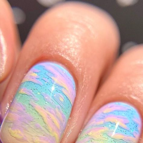 Karenna ✨ on Instagram: "*pr sample/paid* Holo!! @holotaco just dropped their new Pastel Cremes and they're ADORABLE!! 💕 I’ve been incredibly lucky enough to have the chance to work with these polishes and make a cute nail art. These colors reminded me so much of a pastel sky, and that’s what I tried to recreate on my nails! ☁️ The clouds were very fun to do, and I LOVE the extra effect that Scattered Holo Taco has with these nails! I wanna extend a BIG thank you to @simplynailogical and the @h Pastel Sky Nails, Blending Nail Polish, Pastel Cloud Nails, Layered Nail Art, Opal Nail Art, Holo Taco Nail Polish, Holo Taco Nails, Simplynailogical Nails, Holo Nail Art