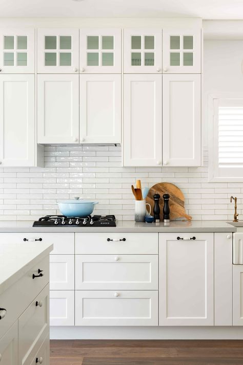 Inspired by The Hamptons of Long Island, New York, this coastal-style kitchen integrates vintage elements with modern to create a casual yet sophisticated feel. Keeping it fresh and crisp with @silestonebycosentino benchtops and @polytec cabinetry, we've used unique tapwear and handles for the ultimate Hamptons vibe. For a custom design and quote appointment, enquire online or send us a DM. Servicing Perth metro area. Hamptons Kitchen Backsplash, Hampton Kitchen Splashback, Hamptons Kitchen Design, Hamptons Kitchen Splashback, Kitchen Hamptons Style, Hampton Kitchen Ideas, Modern Hamptons Style Kitchen, Modern Hamptons Kitchen, Federation Renovation