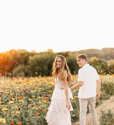 Engagement Photos Floral Dress, Engagement Photos Flowers, Engagement Pictures In Flower Field, Bright Engagement Photos, Engagement Photos Taller Woman, Engagement Photos In Wildflowers, Couples Wildflower Photoshoot, Couple Shoot In Flower Field, Couple Photoshoot Wildflowers