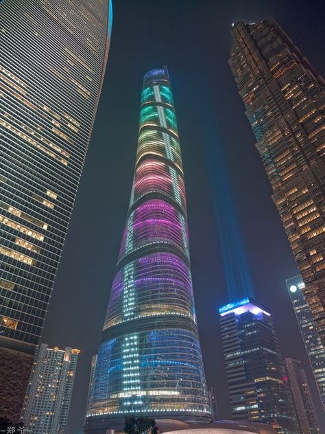 The Shanghai Tower is the newest and tallest skyscraper in Shanghai to date. #skyscraper #shanghai #color #night #architecture #china Shanghai Tower, Future Buildings, Plans Architecture, Facade Lighting, Skyscraper Architecture, Interesting Buildings, Amazing Buildings, Unique Buildings, Unique Architecture