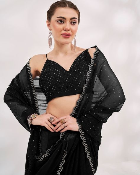 Laxminam Shimmer Chiffon Saree - OP-436 Black Step into elegance with Laxminam's OP-436 Black saree, made from luxurious shimmer chiffon fabric. Perfect for special occasions. Single pieces available. Book now! A stylish and sophisticated Laxminam OP-436 Black saree crafted from premium shimmer chiffon fabric, perfect for evening wear. #Vastraika #LaxminamSaree #ShimmerChiffonSaree #DesignerSaree #BlackSaree #EthnicElegance #SareeLovers #IndianFashion #PartyWearStyle #LuxuryEthnicWear Black Saree, Chiffon Saree, Chiffon Fabric, Single Piece, Evening Wear, Saree Designs, Indian Fashion, Party Wear, Special Occasion