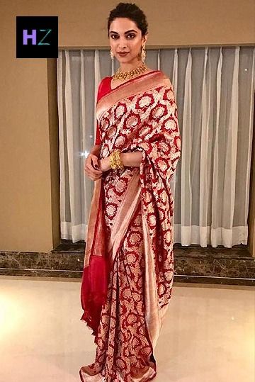 From rocking red Banarasi saree to gold Kanjivaram saree, she clearly has a thing for silk! Check Out #DeepikaPadukone #EthnicFashion Gold Kanjivaram Saree, Red Banarasi Saree, Reception Saree, Kanjivaram Sarees Silk, Saree Wearing, Saree Wearing Styles, Kanjivaram Saree, Indian Bridal Fashion, Kanjivaram Sarees