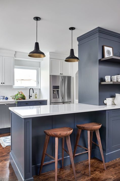 Navy-Blue Kitchen Peninsula Ideas with White Quartz Countertop The sophisticated feel of the navy blue surrounds this transitional kitchen through the base cabinets and peninsula, offering an elegant and stylish appeal. Blue Peninsula Kitchen, Blue Kitchen Peninsula, L Kitchen Layout With Peninsula, Narrow Kitchen Peninsula Ideas, Kitchen Bar Peninsula, Small Kitchen Island Ideas With Sink And Dishwasher, Transitional Kitchen Remodel Ideas, Peninsula Layout Kitchen, Refrigerator Next To Peninsula