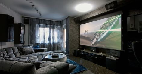 Projectors vs. TVs: Which big screen should rule your home theater? #hometheatreprojectors Home Theater Screens, Basement Home Theater, Home Theater Furniture, Home Cinema Room, Best Home Theater, Home Theater Setup, Home Theater Speakers, Home Theater Rooms, Home Theater Design