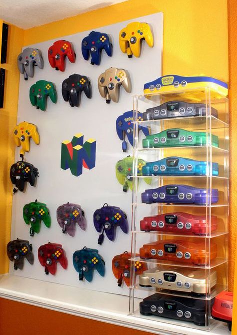 colorful-video-game-controller-storage-ideas Gamer Room Diy, Video Game Storage, Video Game Controllers, Video Game Collection, Nintendo Sega, Game Storage, Video Game Rooms, Game Controllers, Video Game Controller