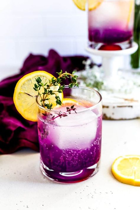 Taylor Swift Midnights inspired mocktail! Lavender-citrus flavor with a hint of vanilla. Taylor would approve. | censoredbaker.com #taylorswift #recipe #foodphotography #mocktail #lavender #lavenderhaze #midnightsrecipe Garnishing Ideas, Taylor Swift Lavender Haze, Taylor Swift Lavender, Best Mocktails, Thyme Simple Syrup, Alcoholic Punch Recipes, Mocktail Drinks, Lavender Recipes, Dairy Free Treats