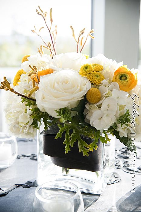 I'm not sure I'd use roses here, but I like the mix. Spring Flower Arrangements Centerpieces, Spring Flower Arrangements, Gorgeous Centerpieces, Vase Arrangements, Spring Beauty, Beautiful Flower Arrangements, Flowers Arrangements, Yellow Wedding, Deco Floral