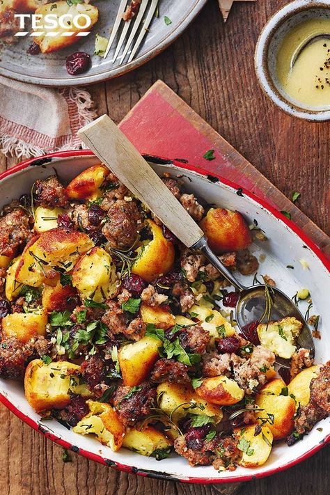 If you can resist eating them all on Christmas or Sunday , turn leftover roasties into this potato and stuffing hash. With crispy stuffing, fragrant herbs and juicy cranberries, this makes the ultimate festive bake. Quick budget family meal recipe ideas for Monday , serve up with leftover roast meats  | Tesco Christmas Meal For 2, Christmas Picky Bits, Christmas Savoury Baking, Christmas Food Recipes Appetizers, Savoury Christmas Food, Christmas Savoury Food, Festive Dinner Ideas, Christmas Recipes Savory, Christmas Dinner Leftover Recipes