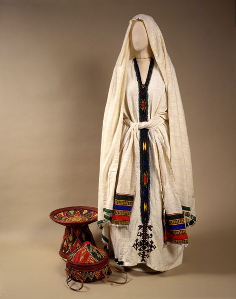 Ethiopian woman’s attire Mid-20th century Jewish Woman Clothing, 20th Century Dress, Jewish Clothing, Biblical Clothing, Hebrew Clothing, Ethiopian Traditional Dress, Ethiopian Women, Ethiopian Dress, Habesha Kemis