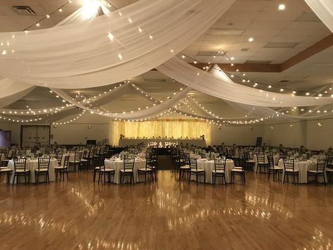 Diy Wedding Ceiling Decorations, Wedding Ballroom Ceiling Decor, Curtain Ceiling Draping, Ceiling Draping Wedding Reception Halls, Tulle Draping Wedding Ceiling Decor, Church Gym Wedding Reception, Event Ceiling Decor, Wedding Drapery Ideas Ceilings, Streamer Ceiling