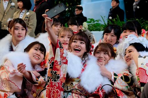 Sake swigging and colourful kimonos: Japan's Coming of Age Day – in pictures Coming Of Age Day Japan, Coming Of Age Day, Birth Rate, Long Sleeve Kimono, Young Prince, Tokyo Disneyland, Childhood Friends, Circle Of Life, Coming Of Age