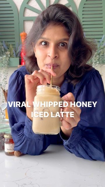 Ayushi Gupta-Mehra on Instagram: "Thanks for the inspiration @a1exzapata ! This whipped honey iced coffee is a game changer, it’s so creamy, so indulgent and almost velvety in texture! 🥹 💯   Non-recipe recipe below to make 2-4 iced lattes (depending on how tall you want your coffee!)  Whip/ beat 1/4 cup honey until it’s lighter in colour.  Add 3-4 tbsp instant coffee + 3-4 tbsp of warm water (in equal measure). Whip again until you have this super creamy and smooth consistency.  Spoon the whipped honey-coffee mixture into your glass. Top with ice and pour in your milk of choice and DIVE IN!  Coffee recipes, iced coffee, whipped honey, iced latte recipe, honey latte, coffee lovers, ASMR coffee, coffee hacks" Whipped Honey Latte, Whipped Honey Coffee, Honey Iced Coffee, Ayushi Gupta, Coffee Whip, Honey Latte, Iced Latte Recipe, Iced Lattes, Whipped Honey