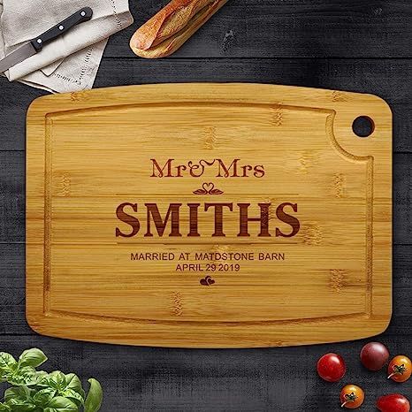 Personalised Chopping Board Bamboo Cheese Board Wedding Gift Laser Engraved Housewarming Gift Custom Wedding, Valentines or Anniversary Present for Families (Mr & Mrs) The laser engraved chopping board is the ideal gift for couples or families, also great as a house warming. Wedding Gifts for couples, Anniversary, Valentines or Birthday present Personalised Chopping board available in 4 designs with the happy couples or families names Wedding Gifts For The Couple, Cheese Board Wedding, Cheeseboard Gift, Personalised Chopping Board, Bamboo Chopping Board, Kitchen Christmas Gifts, Board Wedding, Engagement Gifts For Couples, Wedding Gifts For Couples