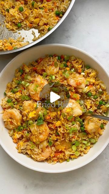 Eloise Felgate on Instagram: "Quick and easy, prawn fried rice. This dish is perfect for your left over rice and so delicious! 🍚🥢🍤 

Serves 2
Ingredients:
- 165g of raw king prawns 
- 1/2 tbsp of garlic & onion granules 
- 1x carrot 🥕 
- 1/2 onion 🧅 
- 3x spring onions 
- 1x tsp chopped garlic 
- Handful of frozen peas 
- 250g day old rice (cold)
- 2x eggs
- 1x tbsp oyster sauce 
- 1x tbsp soy sauce 
- 1x tsp sesame oil
- Salt & pepper
- Olive oil

Method:
1. Season your prawns with your garlic & onion granules, (use whatever seasoning you like) salt & pepper and set to one side
2. Chop up your carrot, onion & spring onions and set aside.
3. Heat up a pan and add your oil. Fry off your prawns for around 4 mins or until they are nice and pink. Remove from pan and set aside.
4. Heat up Prawn Fried Rice, King Prawns, Spring Onions, Oyster Sauce, Chopped Garlic, Spring Onion, Frozen Peas, Sesame Oil, 2 Ingredients