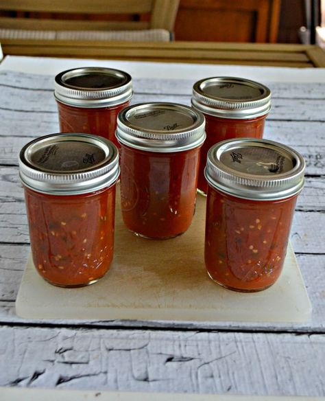 Canning Hot Sauce is easy with tomatoes, vinegar, and a few spices! Making your own hot sauce you control the heat and flavor! Hot Sauce Recipe For Canning, Canning Hot Sauce, Canned Hot Sauce Recipe, Canning Hot Peppers, Fresh Vegetable Recipes, Hot Sauce Recipe, Pepper Sauce Recipe, Homemade Hot Sauce, Hot Sauce Recipes