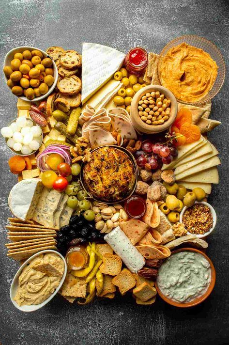 This beautiful epic vegetarian charcuterie board guide includes how to build this exact board with plenty of photos for instruction, what to include on vegetarian charcuterie boards and ideas, a guide to portion size for different sized groups (for two, four, six, ten and twelve) and depending on whether the board is an appetizer or a main...your perfect resource for a light no-cook summer dinner, an appetizer, or a spectacular amazing party platter for entertaining. Vegetarian Chacutery Board Ideas, Vegetarian Graze Board, Spread Board Ideas, Meatless Charcuterie Board Ideas, Charcuterie Board No Meat, Meatless Charcuterie Board, Vegetarian Charcuterie Board Ideas, Charcuterie Board Vegetarian, Indian Charcuterie Board