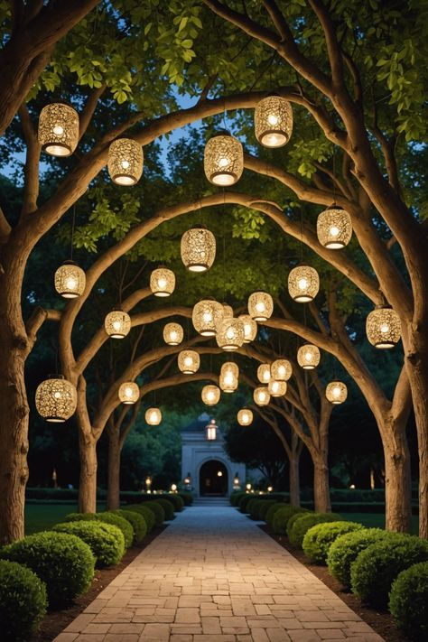 20 Stunning Hanging Patio Light Ideas - Toolz Geek Tree Lanterns Hanging, Lights Hanging From Trees, Patio Lights Ideas, Tree With Lanterns, Patio Light Ideas, Lanterns Hanging From Trees, Hanging Tree Lights, Hanging Patio Lights, Fabric Lantern