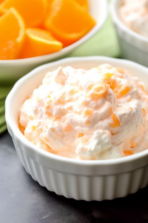 Orange Fluff Salad - That Oven Feelin Orange Jello Cottage Cheese Salad, Mandarin Orange Cottage Cheese Jello Salad, Orange Fluff With Cottage Cheese, Pineapple Cottage Cheese, Orange Fluff Salad, Mandarin Orange Jello Salad, Orange Jello Salads, Congealed Salad, Fluff Salad Recipes