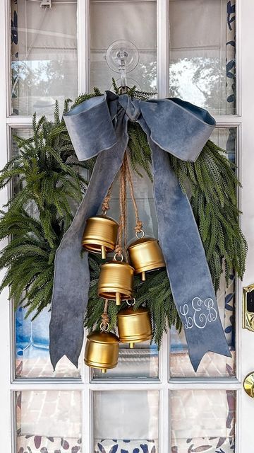 Victorian Christmas Front Door, Hanging Christmas Wreaths On Windows, Wreath With Ribbons Hanging Down, Wreath In Window Christmas, Christmas Kitchen Wreath, Outdoor Window Wreaths Christmas, Christmas Wreath Windows, Wreath With Houses, Wreaths For Windows Outside